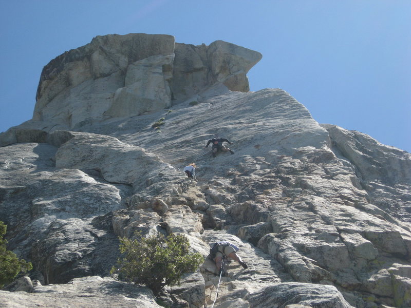 Agina on pitch 1 with climbers on the edge route above her. 6-26-10