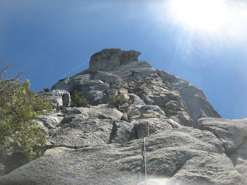 Agina on pitch 1 with climbers on the edge route above her. 6-26-10