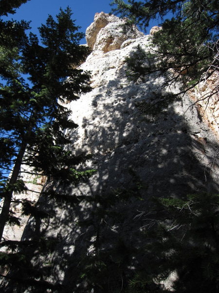 The light in this photo is pretty bad, but the photo should help you find the climb. Big Medicine climbs the right side of this formation starting in grey, slabby rock. Pale Face Magic is on this same formation, but around the corner to the left.
