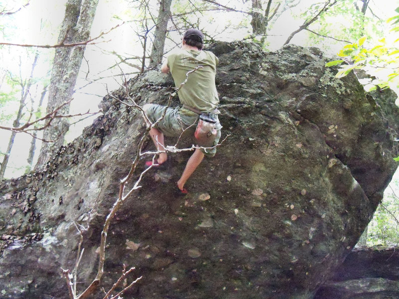 Travis Horne on the "Plasma Arete" (V4) with "Please Bleed" (v5) to the right. Rock House Area, GHSP.