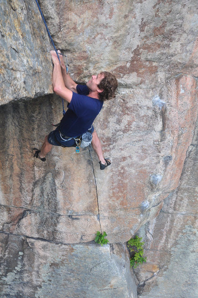 Jeff Arliss contemplating the crux.