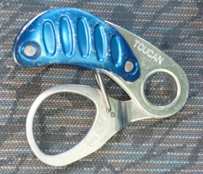 This is a novel auto blocking belay device. I think it works quite well, depending on rope thickness and sheath quality, it belays very smooth. Great to lower with. You gotta love over engineering. $3 at a gear swap!