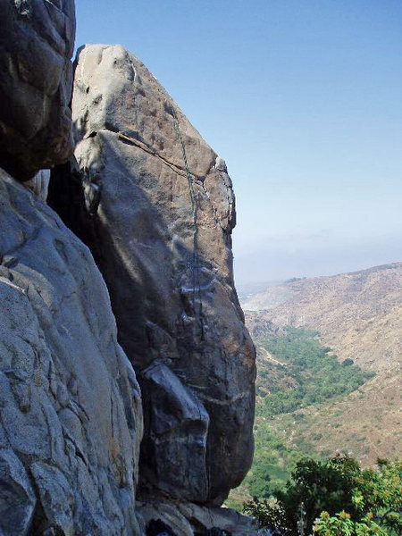 The rope is hanging on the route. Start on the right side of the lower block.