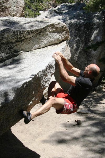 Mike moving along the lip to the finishing mantle.