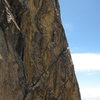 T. Chrudinsky climbs on a 100 foot 5.10c on the southeast face of High Eagle Dome.