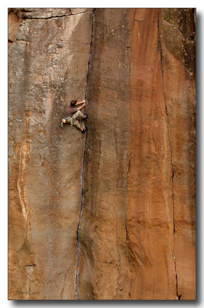 Scotty works the layback over the second cruxy bulge on the flirtatious and classic Paradise Lost 5.12-, Paradise Forks.