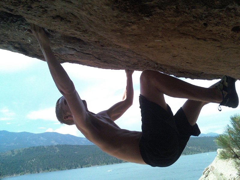 Going from a jug in the roof to a bad right hand pinch with a shallow two finger pocket. Crux.