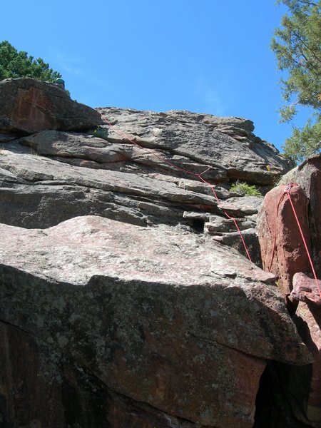 Brian seconding the downclimb to the South. We chose to rope up and protect the downclimb after soloing the climb. The moves below the right facing corner, near the top of the photo are perhaps 5.3.