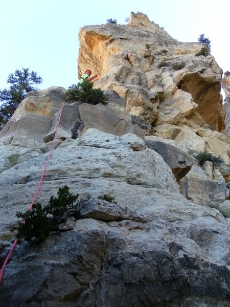 Scoping the bolted face climbing