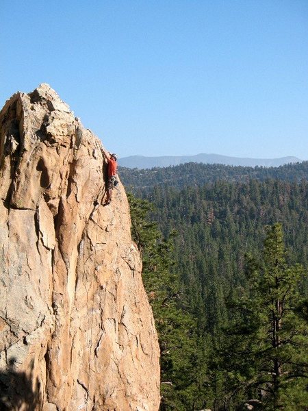 Clipping the chains on Coyotes in the Henhouse (5.10d), Holcomb Valley Pinnacles