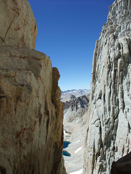 the notch after the 5.8 downclimb (basically a set of 2 short boulder problems, the second of which is in the left of the photo)