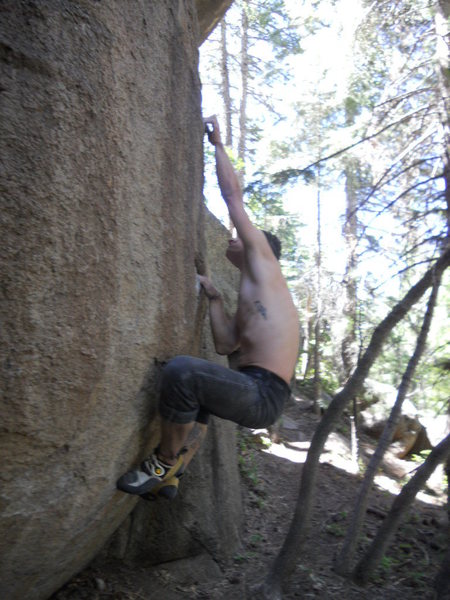 crimpy side pull-esque crux hold