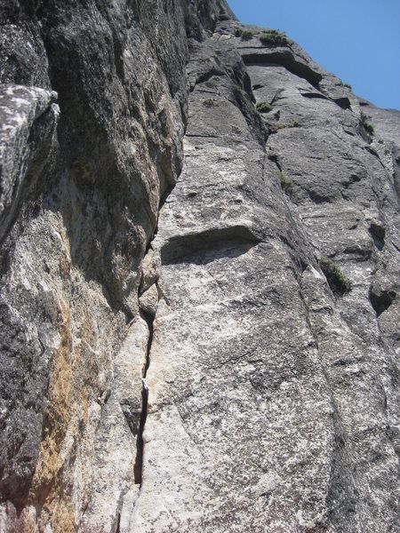 A look at the good quality of pitch three and the rarely climbed upper top-out pitches (5.9)