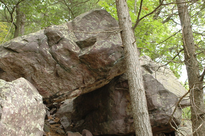 Another random boulder in the woods to the east of The Jewel. Possibly a cool little powerful boulder problem.