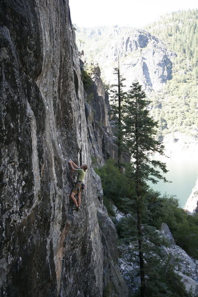 There is a good rest at the transition from gear protected crack climbing to bolted face climbing. The 13b twin seams are above my head to the left. <br>
photo by S. Giffin