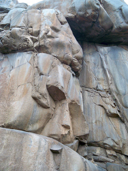 Unnatural Act. Link features up the rounded arete. The rope over a different route in this photo.<br>
<br>
My wife says you can see and easter island type face at the start.