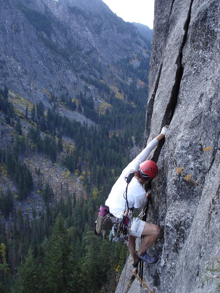 unknown climber on the 5.10 "direct" first pitch of Outer Space.