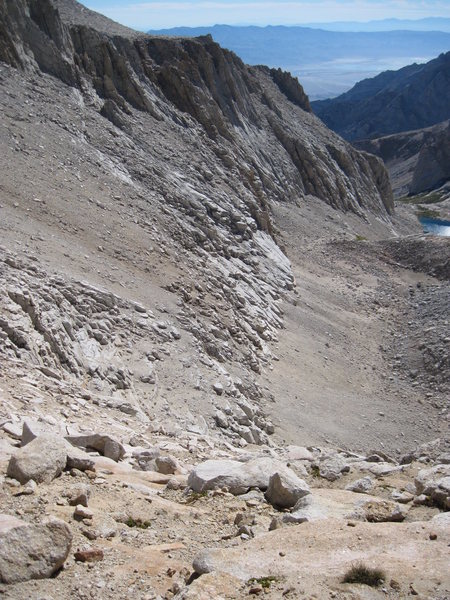The use tail and scree slope below the south face. Taken from the "L Shaped Pass".