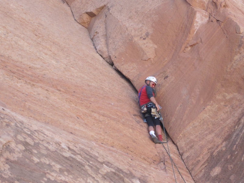 Ross just below the 5.11 section . The chock stone just above him pulled as he was attempting to climb higher to place the pro bolt causing a fun short fall ,the stone narrowly missing his belayer !! Don't ask about the socks....