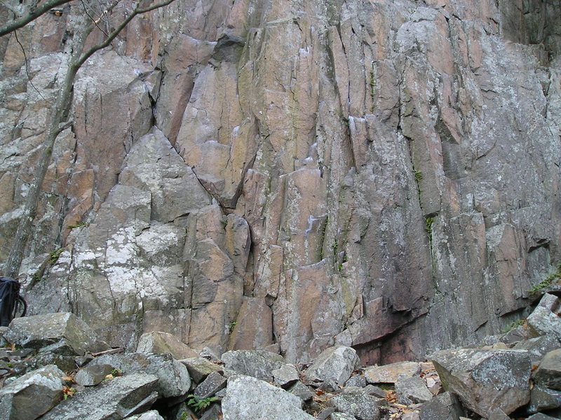 Start of 5.10D, crux is 20 feet up. Starts immediately on right side base of the 10-A "triangle", has seperate bolts.