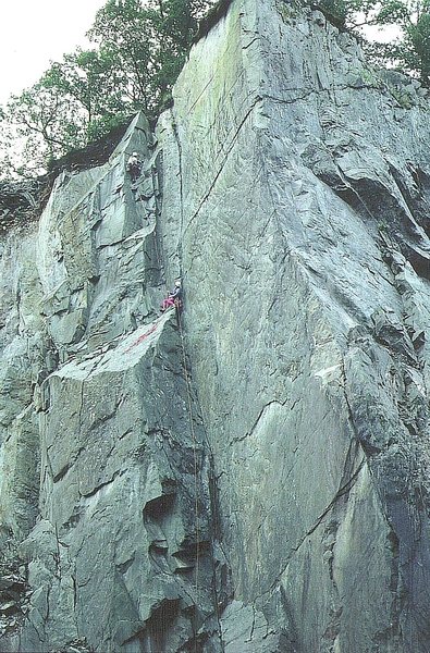 Paul Ross on P2 the first ascent .The knife edge on the right is the Titanic Arete. Photo Tony Greenbank.