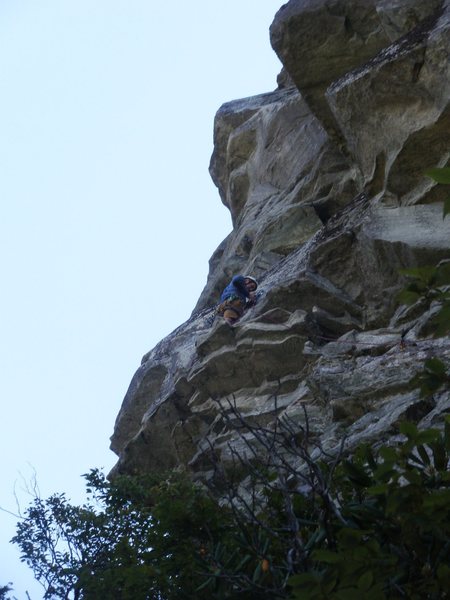 Ship Rock, Hindu Kush, Carl at 1st belay-standing on crux roof.