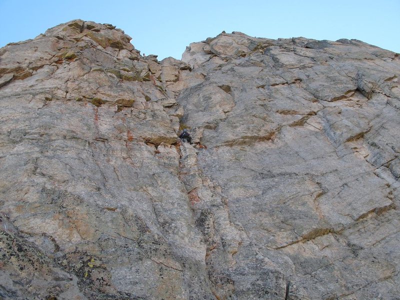 A climber about half way up the crux pitch on Sep. 19, 2010. The (barely visible) belayer at the top of the pitch is above the left exit variation. The right exit seemed to be easier.