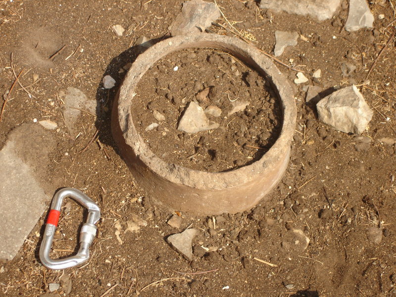 It appears that we weren't the first ones to climb up here! Remains of a ceramic vessel found on a ledge, roughly 200 meters above the river.