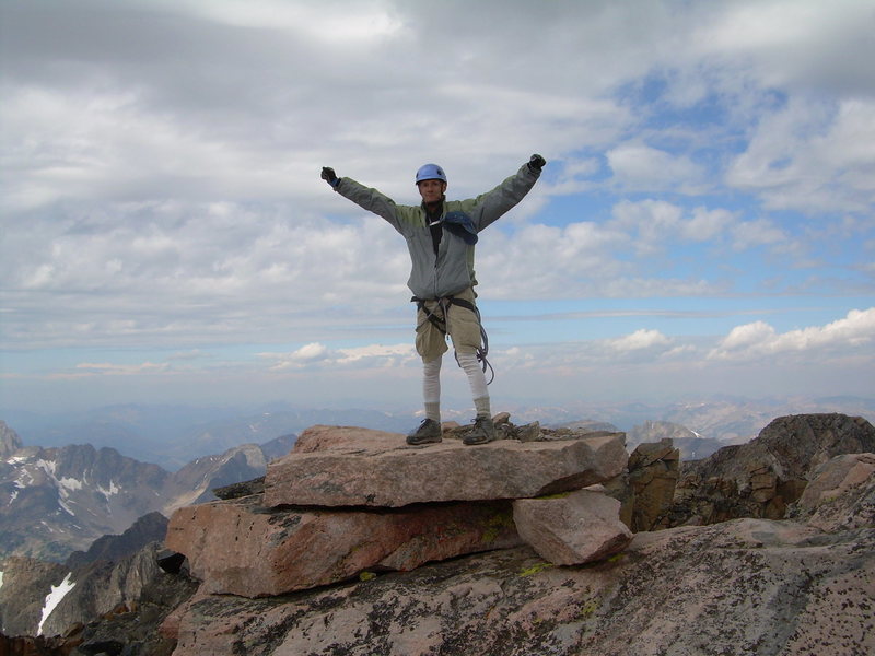 Standing atop Granite Peak's summit block