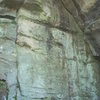 "Animal Husbandry" 5.12c is the middle face. "Belching Fiancé" 5.12a is the left finish of Animal. <br>
<br>
The right crack is a Aid Line "Left Turn".