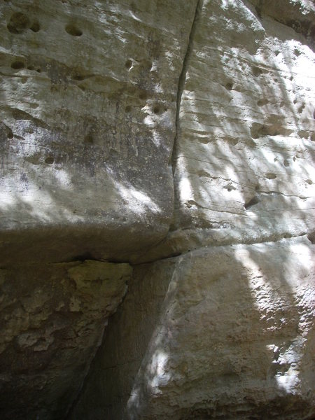 "Flaire" 5.12d climbs straight up the wide crack. going right at the roof is "DSB" 5.12c