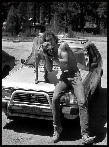 Tahoe climbing pioneer Paul Crawford, his dog Callie and his subaru which had hit three different bears.<br>
Photo by Blitzo.