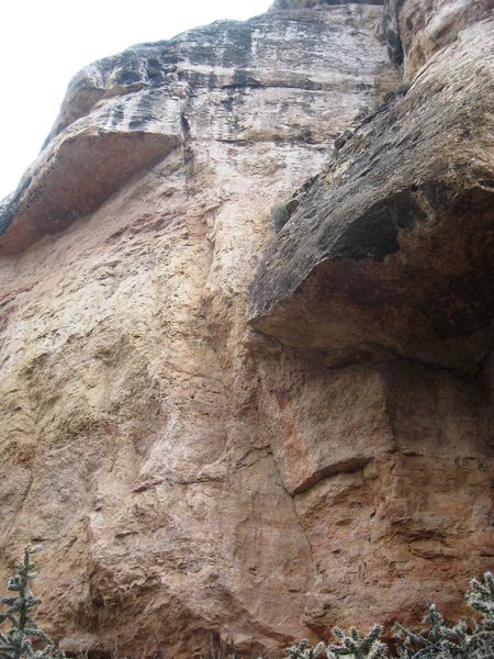 EBDGAB follows the central corner system towards the right end of the high roof, then up the black crack to the top of the wall.