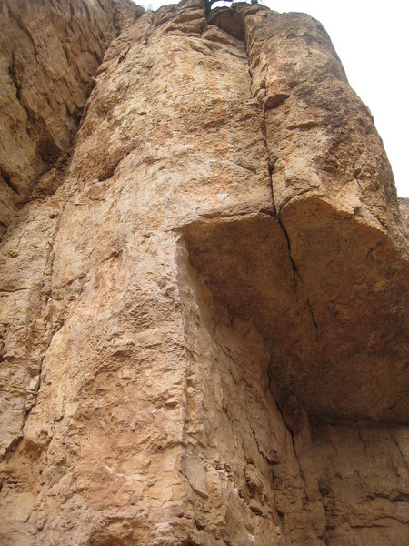 Blast from the past climbs right of the corner to the roof, over the roof with difficulty, left to the big hueco then straight up to the small tree.