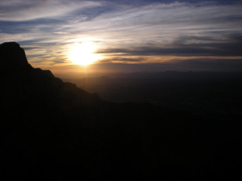 sunset from the summit. i think that's table mt. at left. put that camera away and let's go find the raps!!