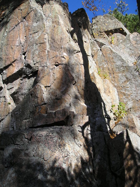 Good look bolts closely spaced on crux in top center