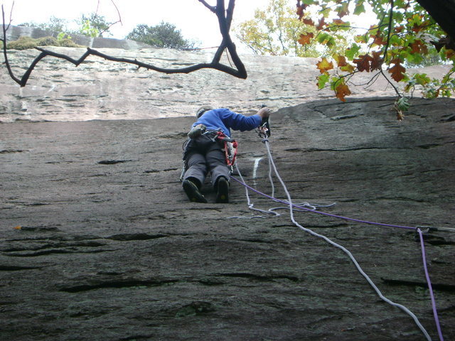 putting up pitch one. Pretty much a plumb line up the three sections of cliff shown in photo.