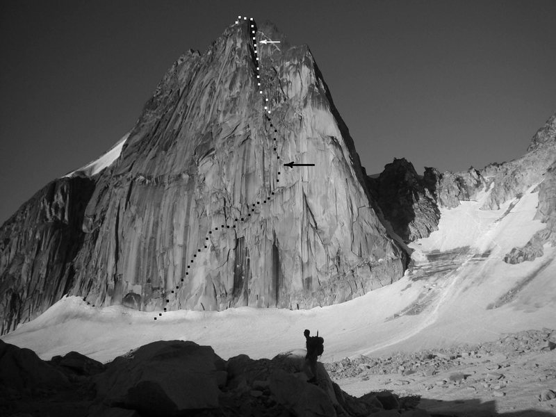 Detail of Sunshine Wall<br>
photo by MP contributor Joe Leonhard<br>
<br>
White Arrow - Aid up thin crack in Buckingham Route chimney.<br>
<br>
Black Arrow - 5.10 squeeze chimney