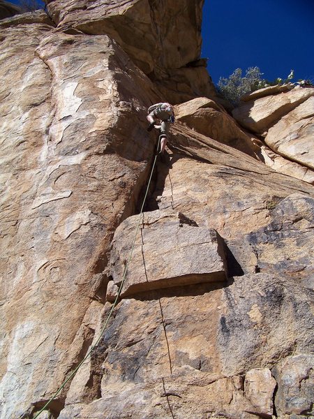 A superb lieback crack at sun spots. Gosh the upper section is tough for 10+