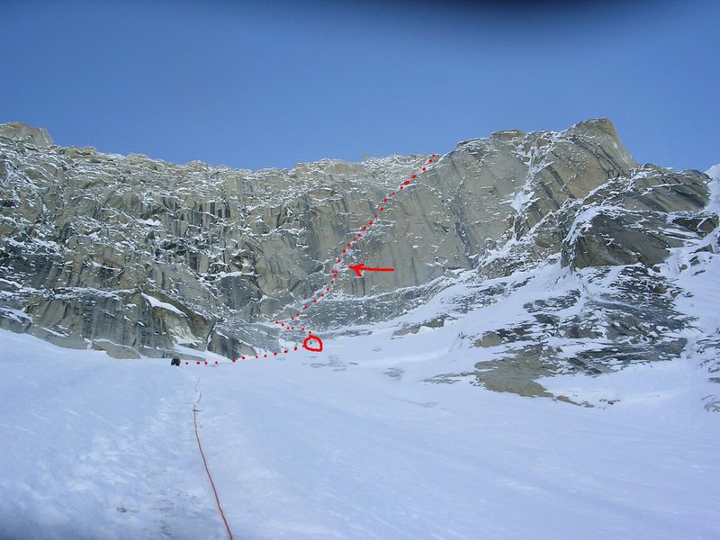 Scott Visscher, just above the 'schrund.<br>
<br>
Red circle - climber<br>
Red arrow - ice nose at crux<br>
<br>