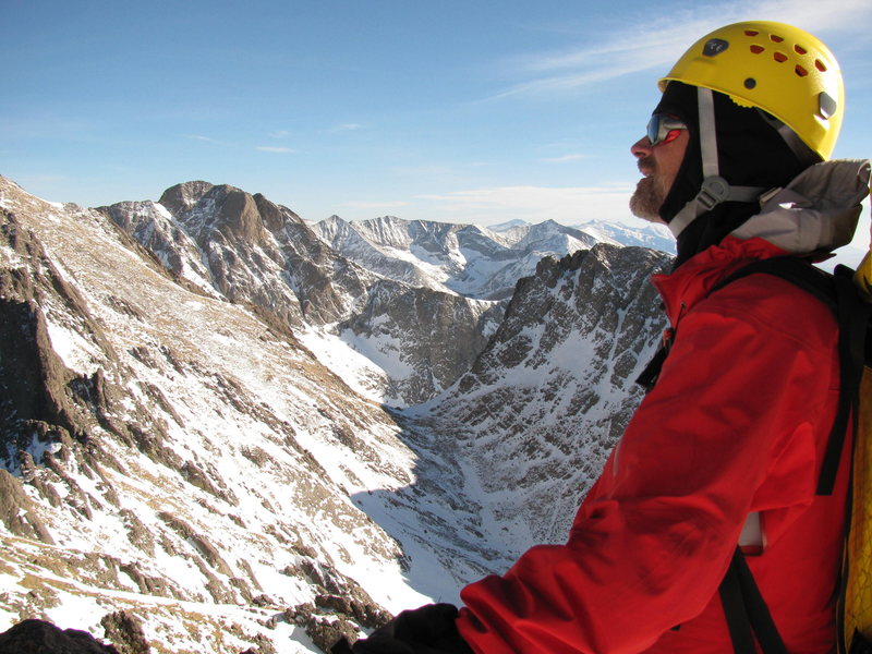 Paul Crowder enjoying a calm clear February day on the top of Crestone Needle.
