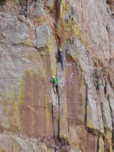 Taken from the West Ridge. Climber is on the 5.9 var.