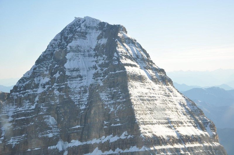 ASSINIBOINE, NORTH RIDGE<br>
Photo by Troy Kirwin MG<br>
Published @ ACMG<br>
<br>
From the Red Band at bottom, to the Gray Band at top, the tracks in this early snow stayed right of the shade line. <br>
<br>
<br>