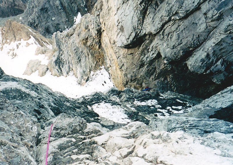 Mike following the wet chimney pitch.