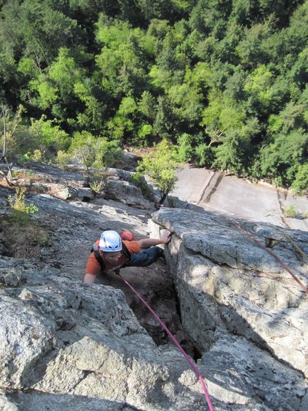 pitch 5, Changing Corners, 10b. Steep up a left-facing corner, then some bolt-protected face moves, before this final right-facing corner