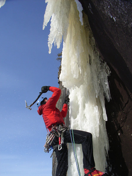 James Loveridge leaving the belay cave on the first free ascent of the 2nd pitch of Arjumand's Shroud.