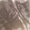 Devils Thumb, North Face<br>
Photo by Maynard M Miller<br>
(pioneering glaciologist)<br>
from AAJ, 1947<br>
"West of the Stikine"<br>
by Fred Beckey<br>
<br>
The North Face is unclimbed?  This photo shows the Plumb-Stutzman going right up it, only a bit left of center.  <br>
