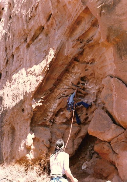 Project - Breaking the Law (5.10?) - Day 1<br>
<br>
Scotty working his way up the pockets, January 1986. Billy F with the belay.