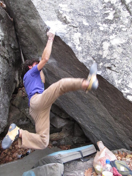 Aaron Parlier sending Albatross (v9) on the Diamond Boulder, Cereal Buttress Area, Rumbling Bald NC