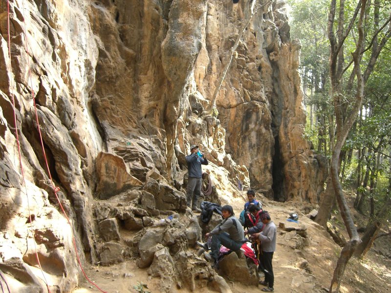 Looking toward the right hand side of the cliff. The locals are resting between climbs.